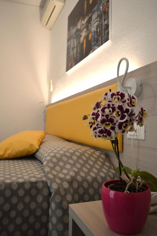 Postel nebo postele na pokoji v ubytování Hotel Le Star