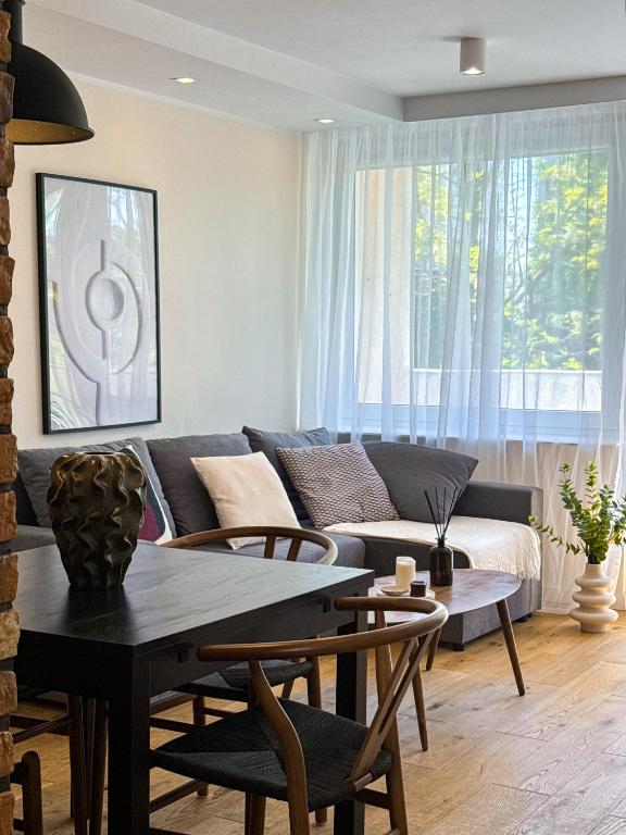 Posedenie v ubytovaní Przytulny apartament 5 minut od morza