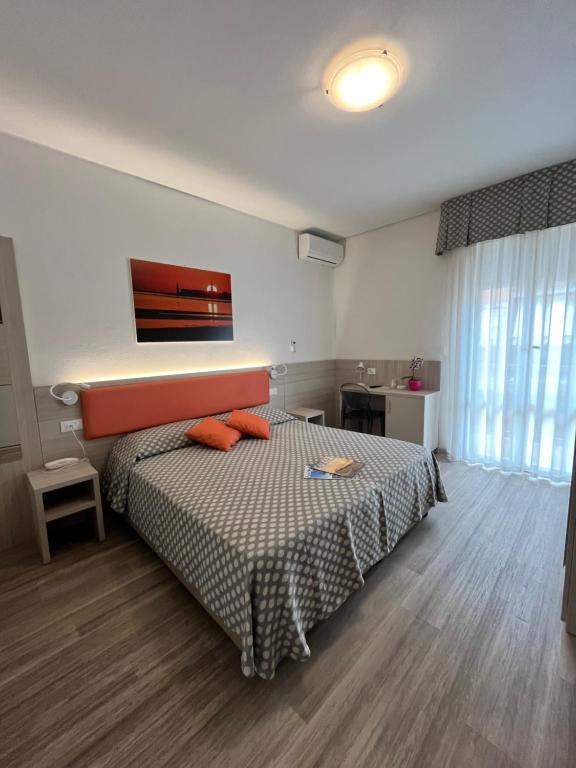 Postel nebo postele na pokoji v ubytování Hotel Le Star