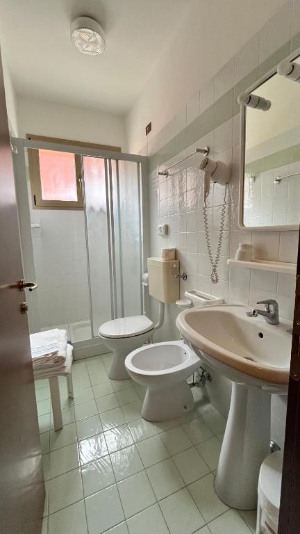 Koupelna v ubytování Hotel Le Star