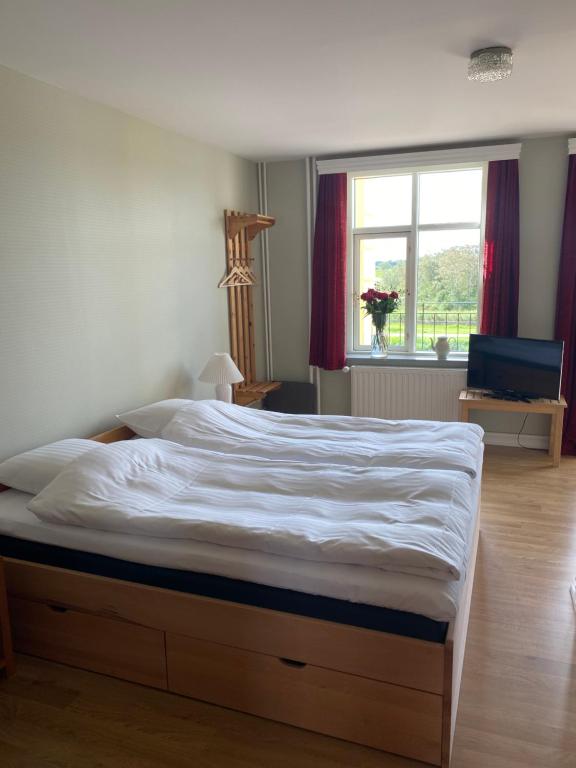 Postel nebo postele na pokoji v ubytování Badehotellet Grenaa Strand