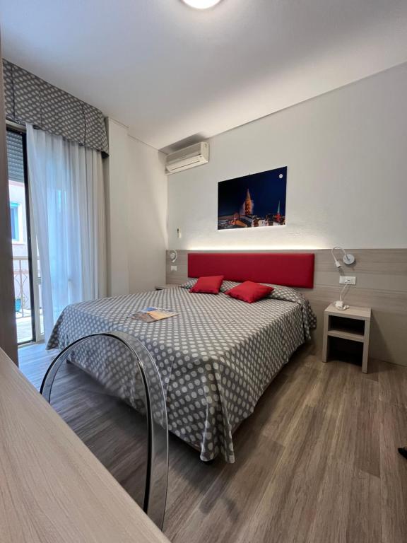 Postel nebo postele na pokoji v ubytování Hotel Le Star