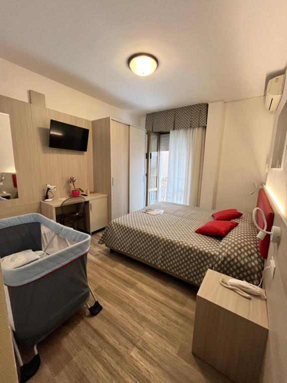 Postel nebo postele na pokoji v ubytování Hotel Le Star