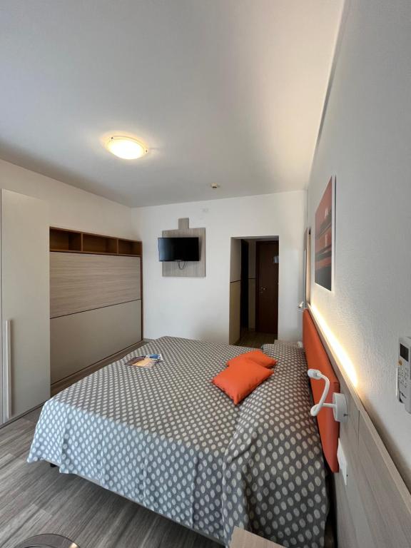 Postel nebo postele na pokoji v ubytování Hotel Le Star