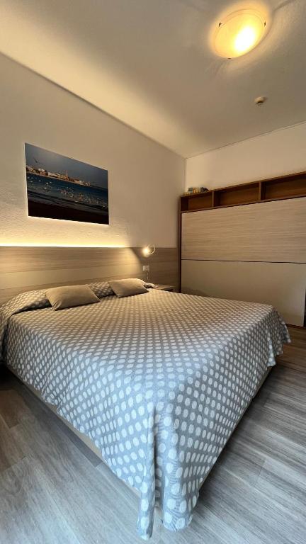 Postel nebo postele na pokoji v ubytování Hotel Le Star