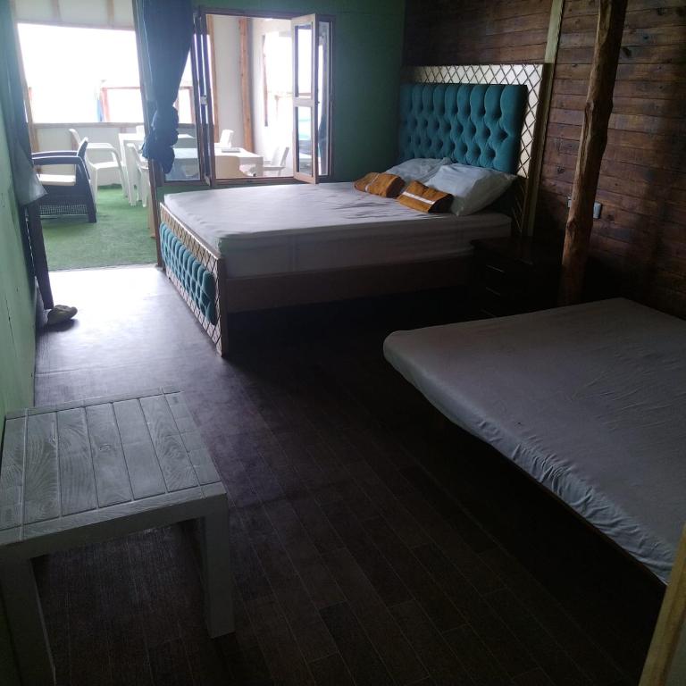 Una cama o camas en una habitación de Cabañas Palos Locos