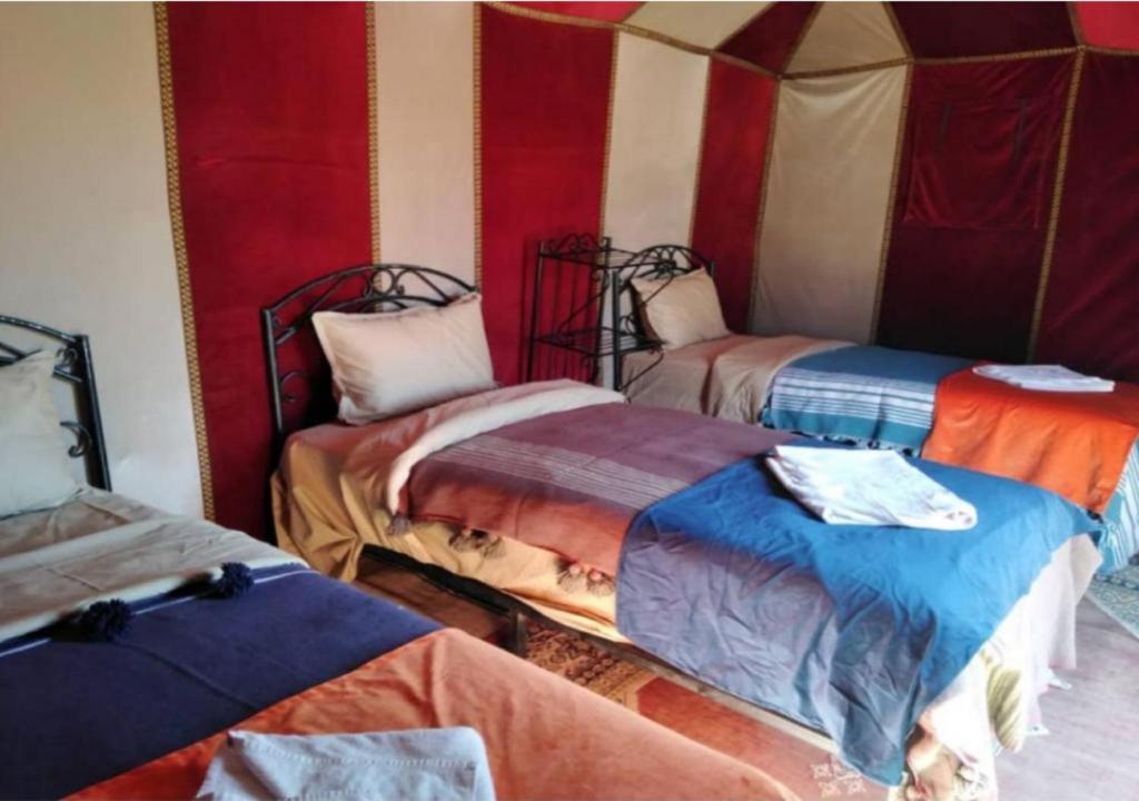 Postel nebo postele na pokoji v ubytování Berber Safari Camping