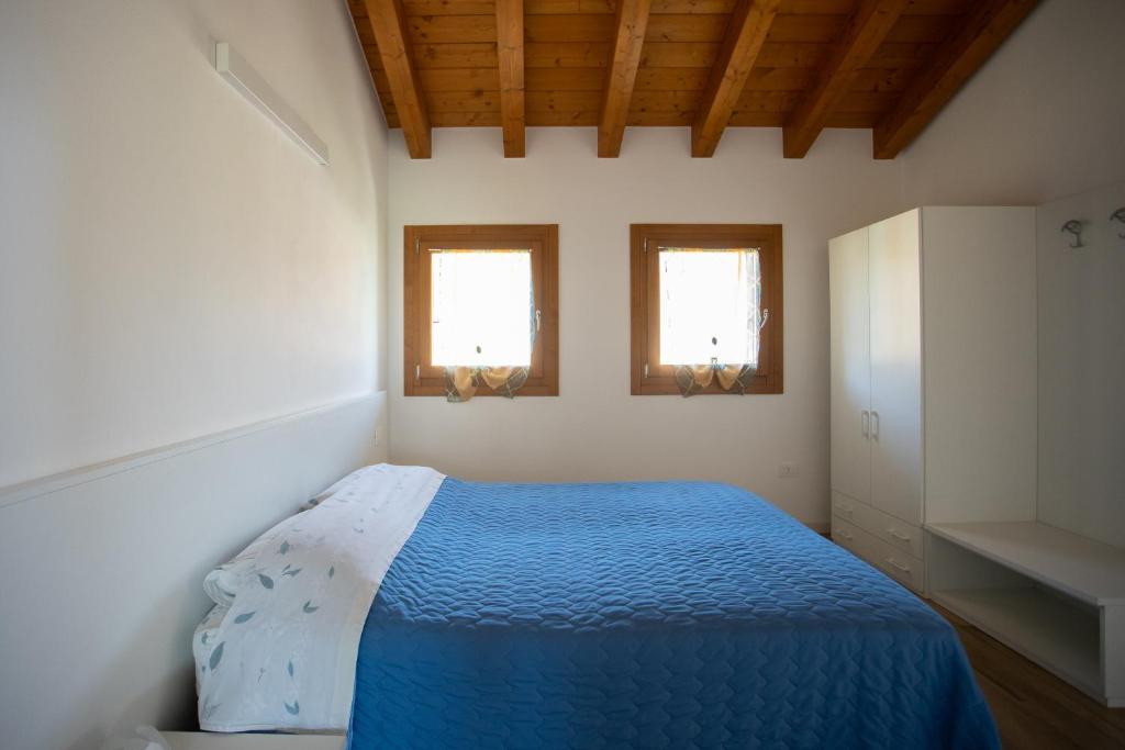 Postel nebo postele na pokoji v ubytování Casa Oliver