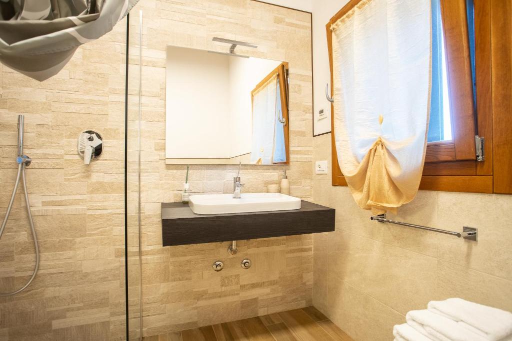Koupelna v ubytování Casa Oliver
