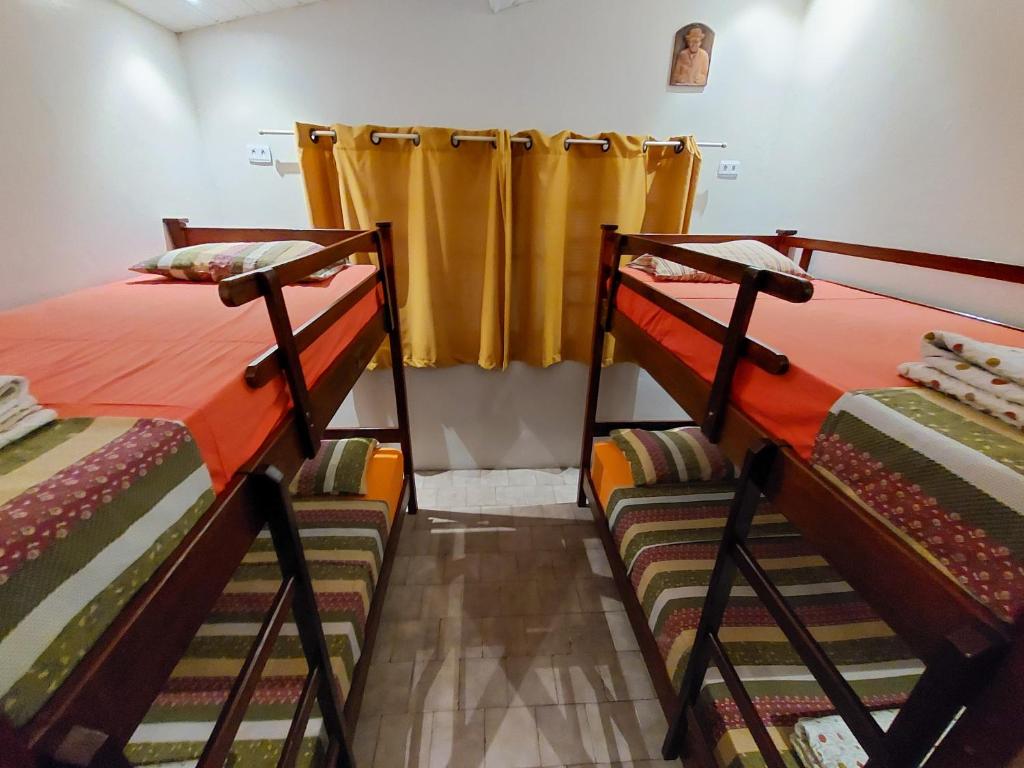 Postel nebo postele na pokoji v ubytování Hostel Pajeú