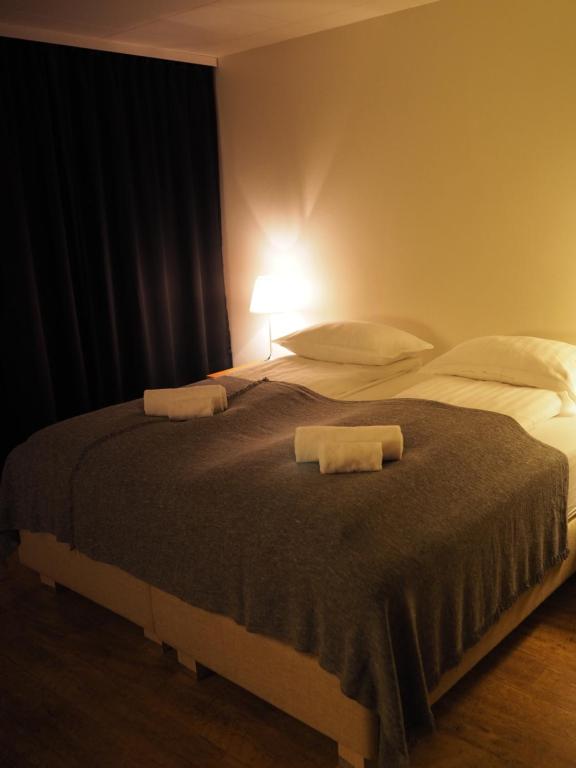 Letto o letti in una camera di Fisherman Guesthouse Sudureyri