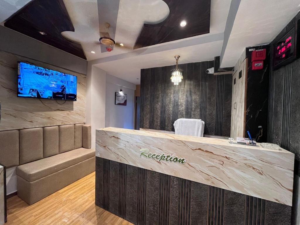 TV a/nebo společenská místnost v ubytování Hotel Privilon