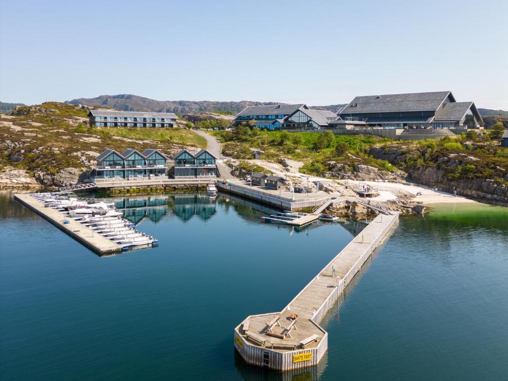 an aerial view of a marina with boats and a dock at Panorama Hotell & Resort in Steinsland