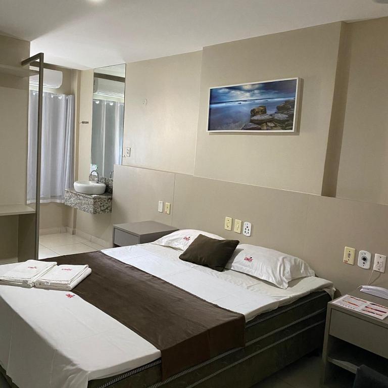 Postel nebo postele na pokoji v ubytování Onix Hotel Aeroporto