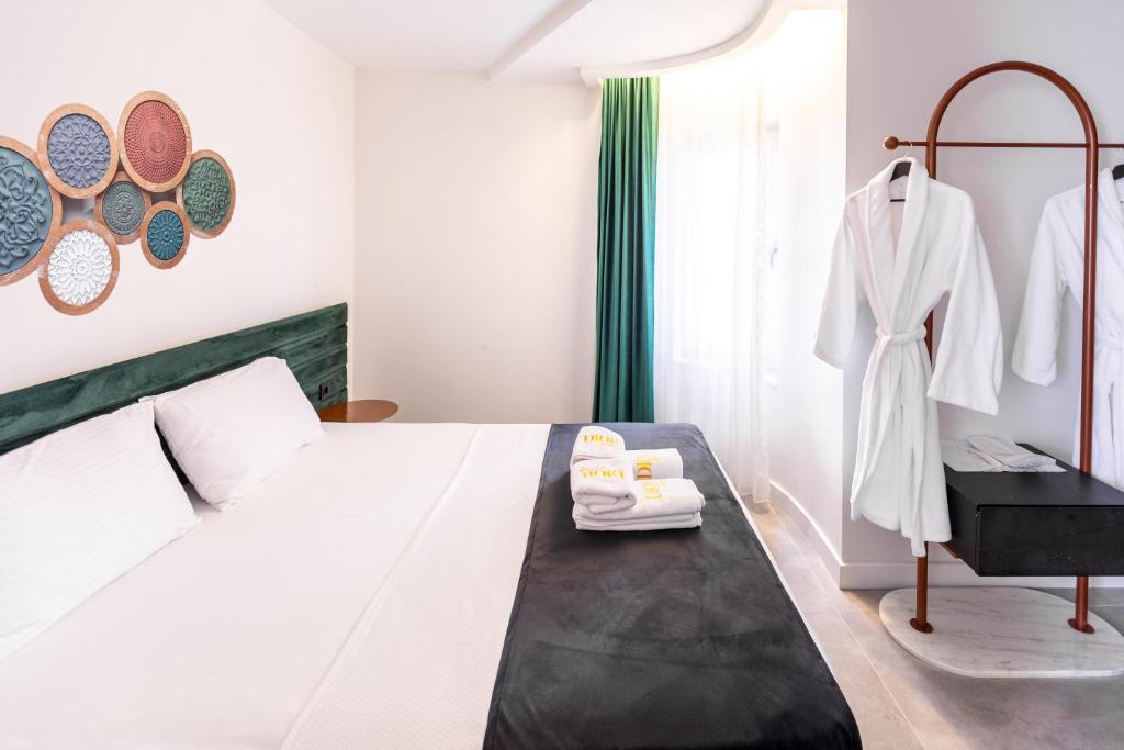 Кровать или кровати в номере Dior Living Hotel & Spa