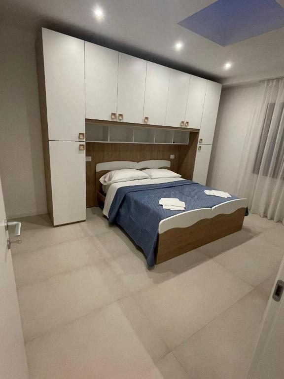 Postel nebo postele na pokoji v ubytování B&B La Coccinella