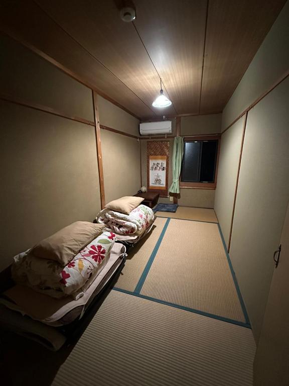 Postel nebo postele na pokoji v ubytování Hostel Otro Mundo