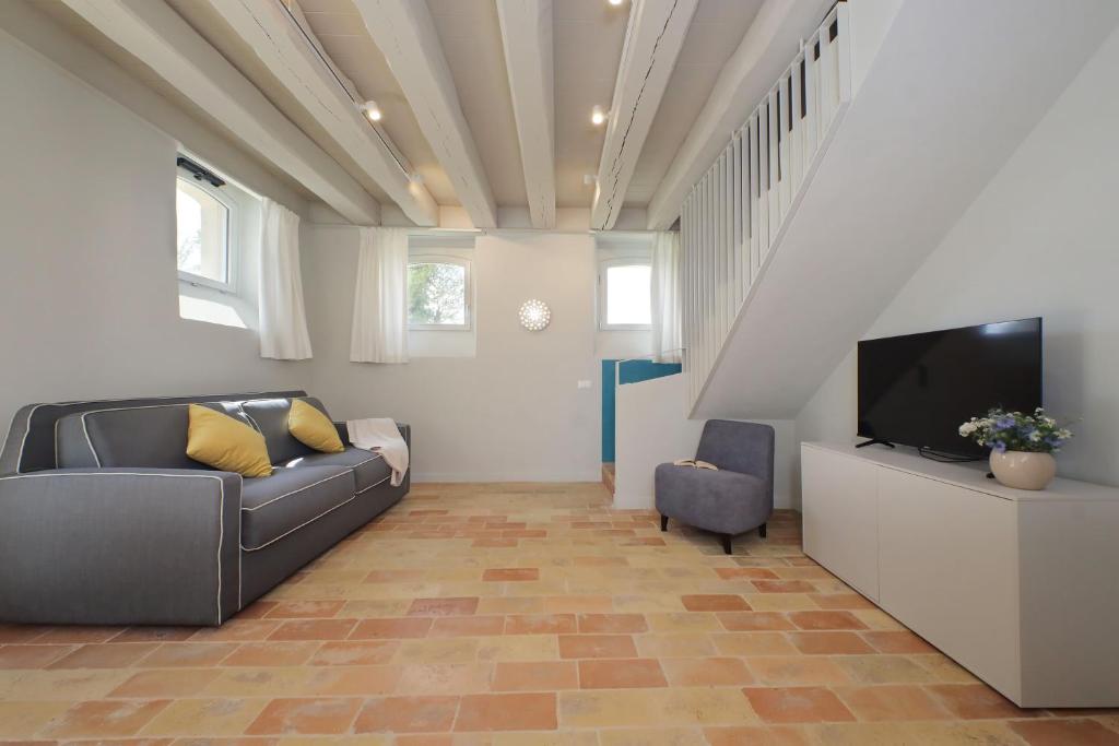 TV a/nebo společenská místnost v ubytování Agriturismo Biancarda