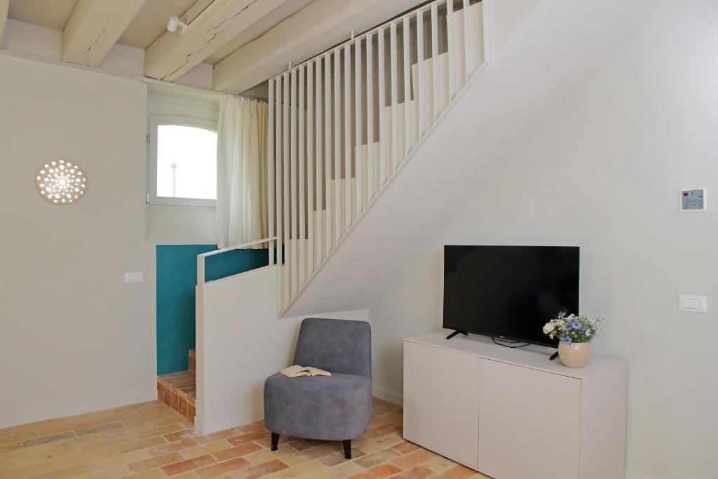 TV a/nebo společenská místnost v ubytování Agriturismo Biancarda