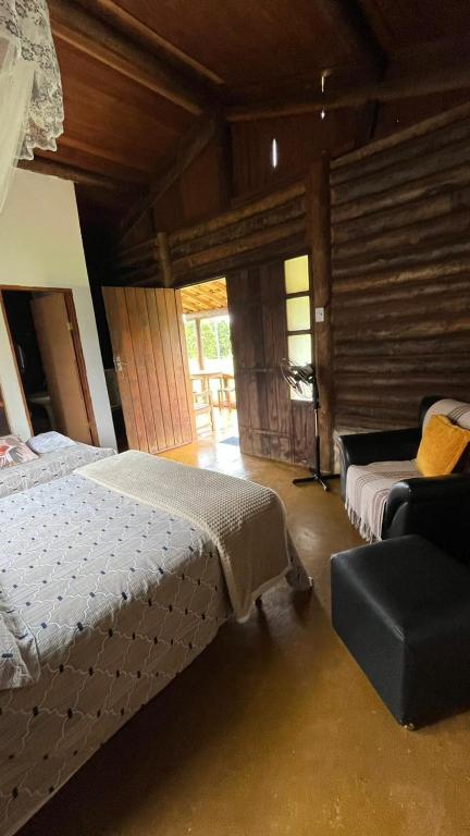 Postel nebo postele na pokoji v ubytování Complexo Luquinha
