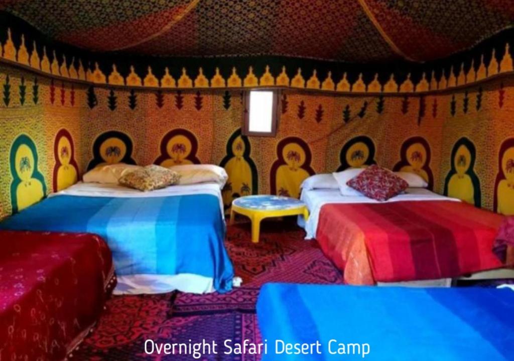 Postel nebo postele na pokoji v ubytování Berber Safari Camping