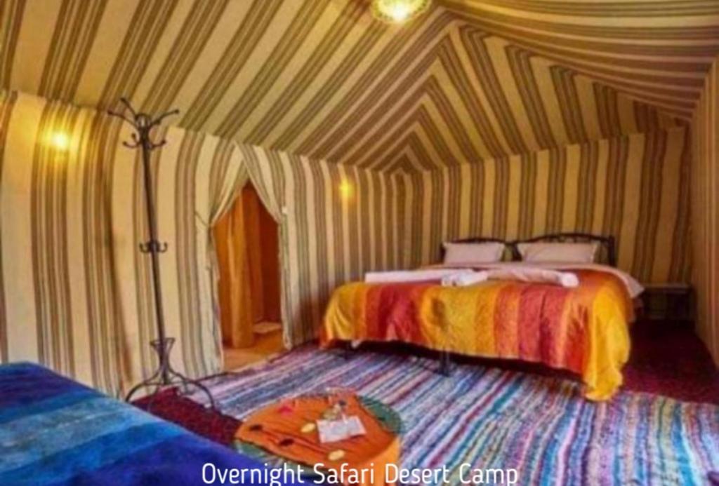 Postel nebo postele na pokoji v ubytování Berber Safari Camping