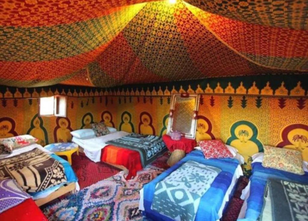 Postel nebo postele na pokoji v ubytování Berber Safari Camping