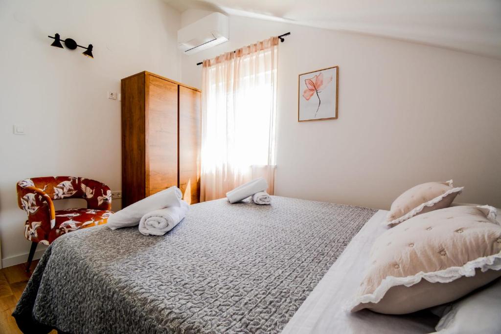 Postel nebo postele na pokoji v ubytování Kuća za odmor LAVANDA