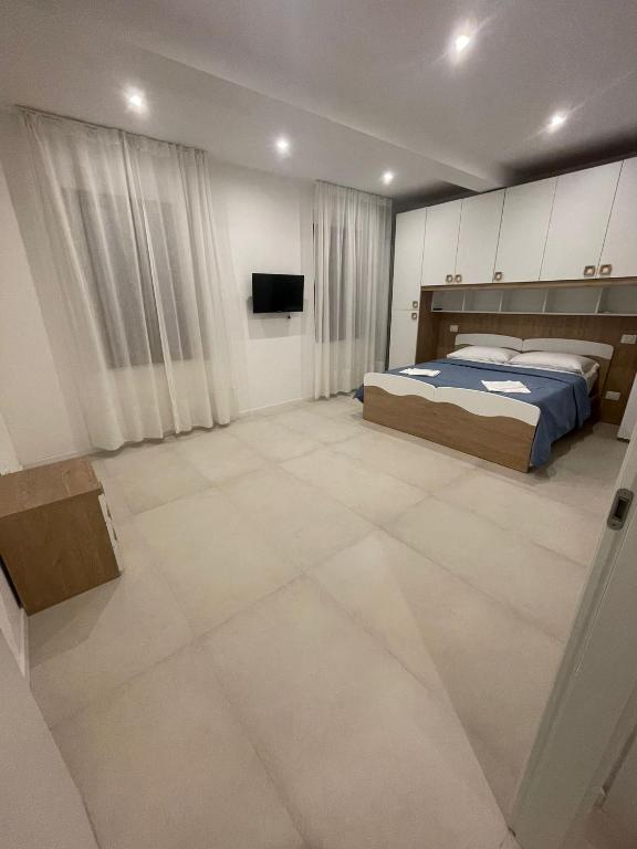 Postel nebo postele na pokoji v ubytování B&B La Coccinella