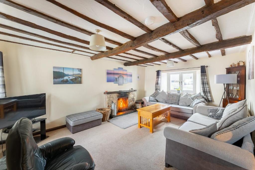 Et opholdsområde på The Farmhouse at Thompson Ground