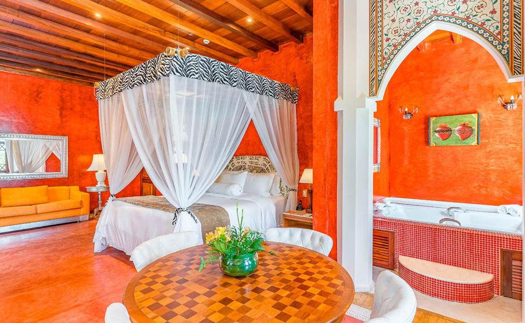 Postel nebo postele na pokoji v ubytování DPNY Beach Hotel & SPA Ilhabela