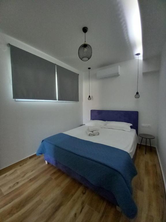 Posteľ alebo postele v izbe v ubytovaní Antoni's Rooms