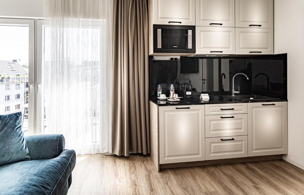 Sleep Inn Düsseldorf - Resim 21