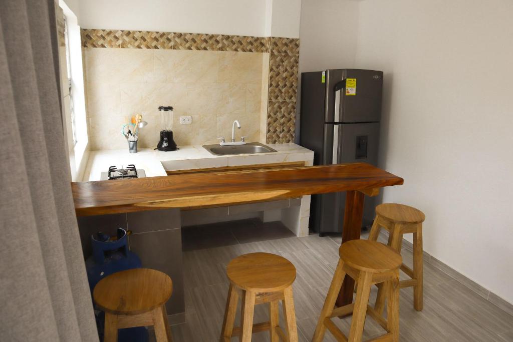 Kuchyň nebo kuchyňský kout v ubytování Apartamento Villa Carolina 101