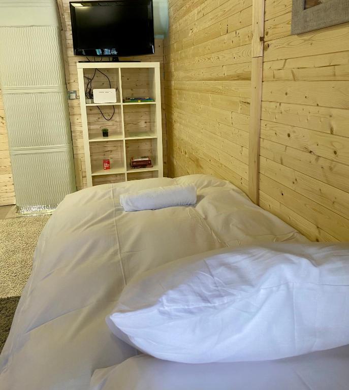 Postel nebo postele na pokoji v ubytování Henno Studio Apartment