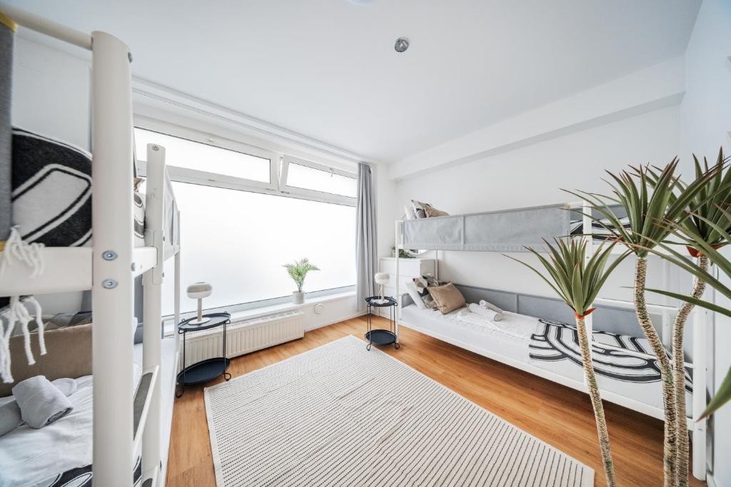 Postel nebo postele na pokoji v ubytování Central Apartment Lofts