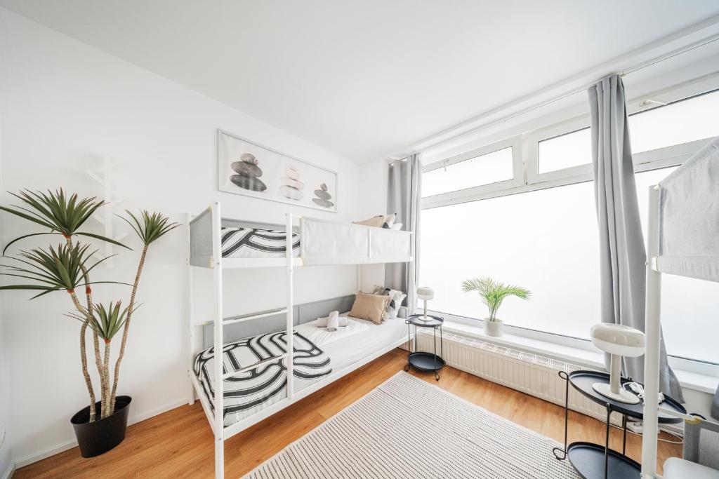 Postel nebo postele na pokoji v ubytování Central Apartment Lofts