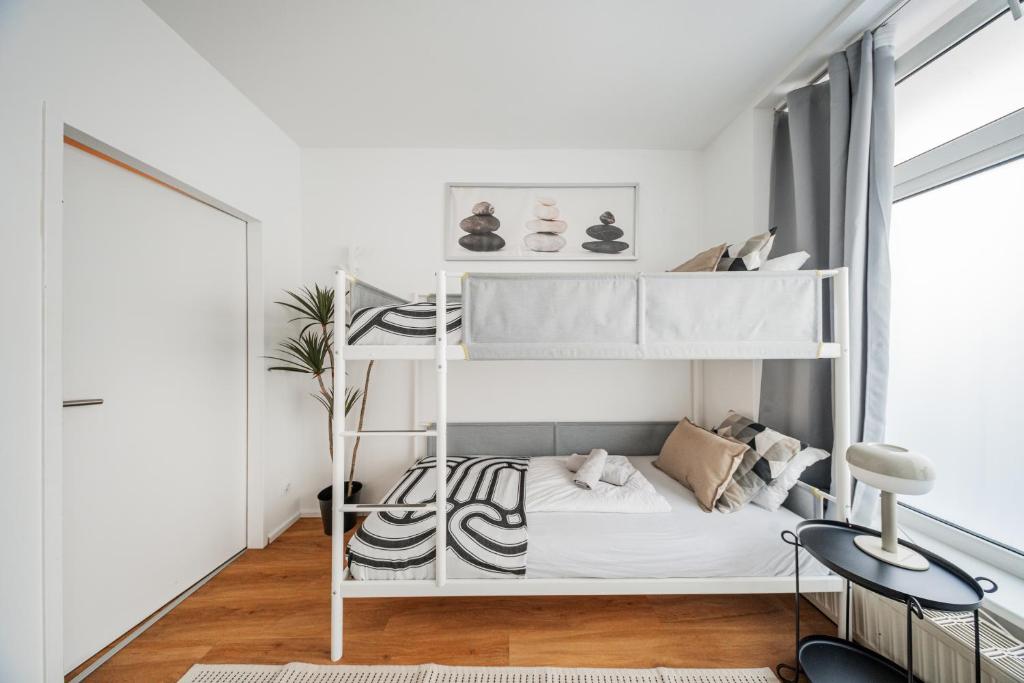 Postel nebo postele na pokoji v ubytování Central Apartment Lofts