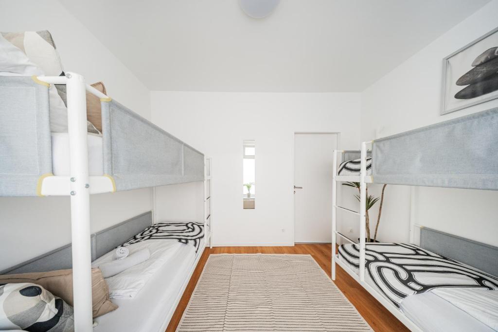 Postel nebo postele na pokoji v ubytování Central Apartment Lofts