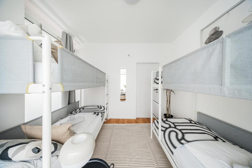 Postel nebo postele na pokoji v ubytování Central Apartment Lofts