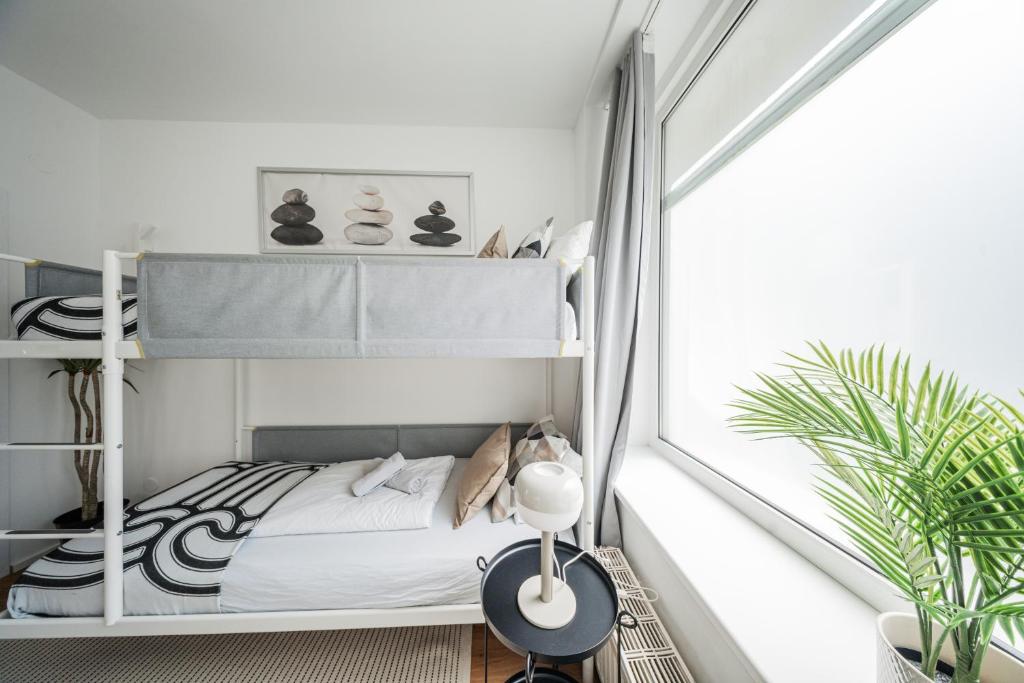 Postel nebo postele na pokoji v ubytování Central Apartment Lofts