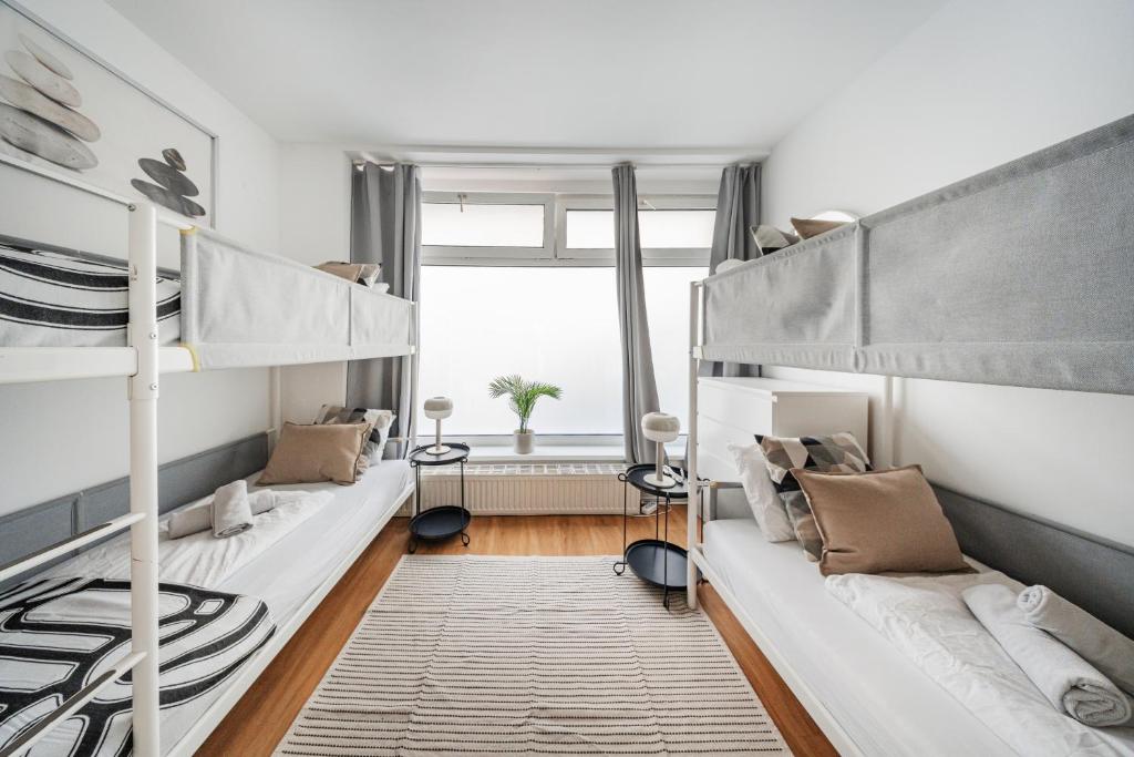 Postel nebo postele na pokoji v ubytování Central Apartment Lofts