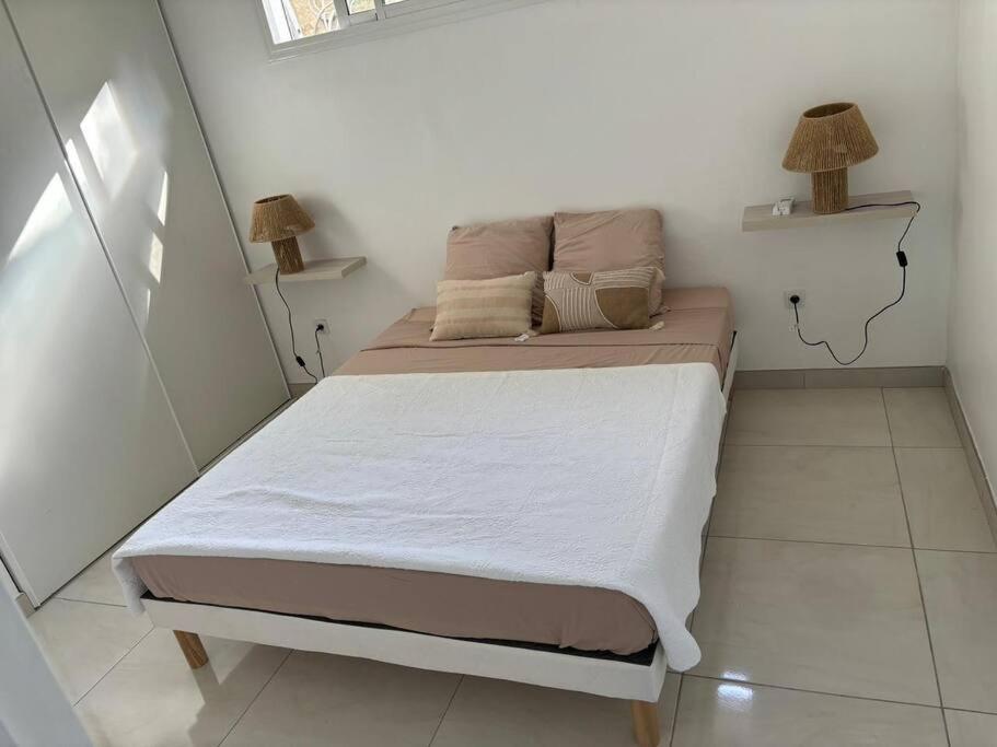 Postel nebo postele na pokoji v ubytování Villa Noo La