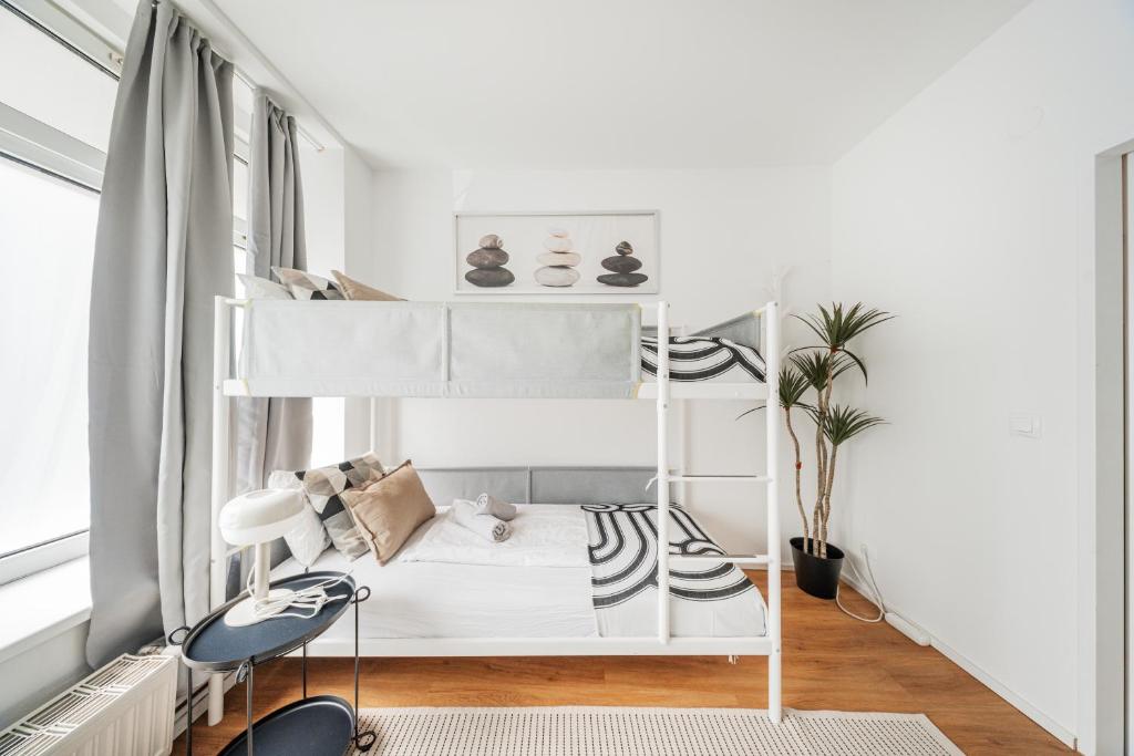 Postel nebo postele na pokoji v ubytování Central Apartment Lofts