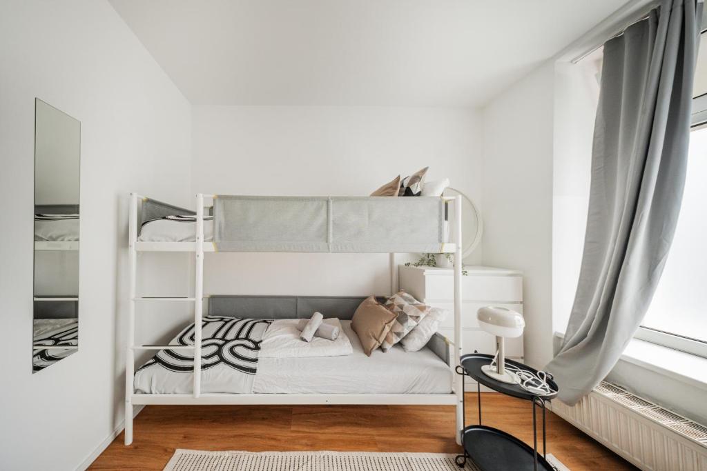 Postel nebo postele na pokoji v ubytování Central Apartment Lofts