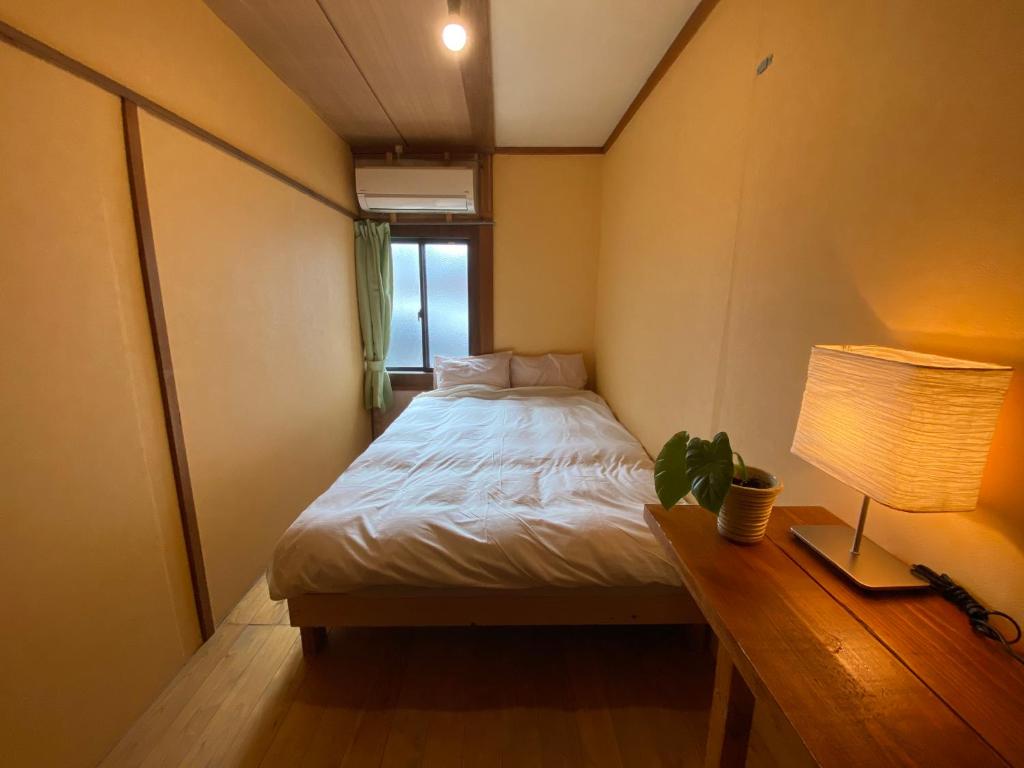 Postel nebo postele na pokoji v ubytování Hostel Otro Mundo