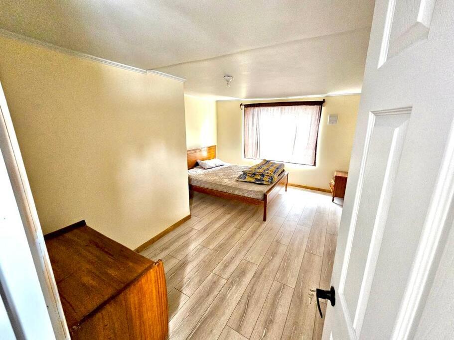 Postel nebo postele na pokoji v ubytování Casa en el Tabo