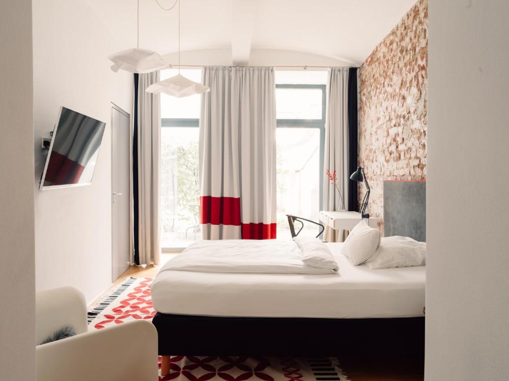 Postel nebo postele na pokoji v ubytování My Home in Vienna - Smart Apartments - Landstraße