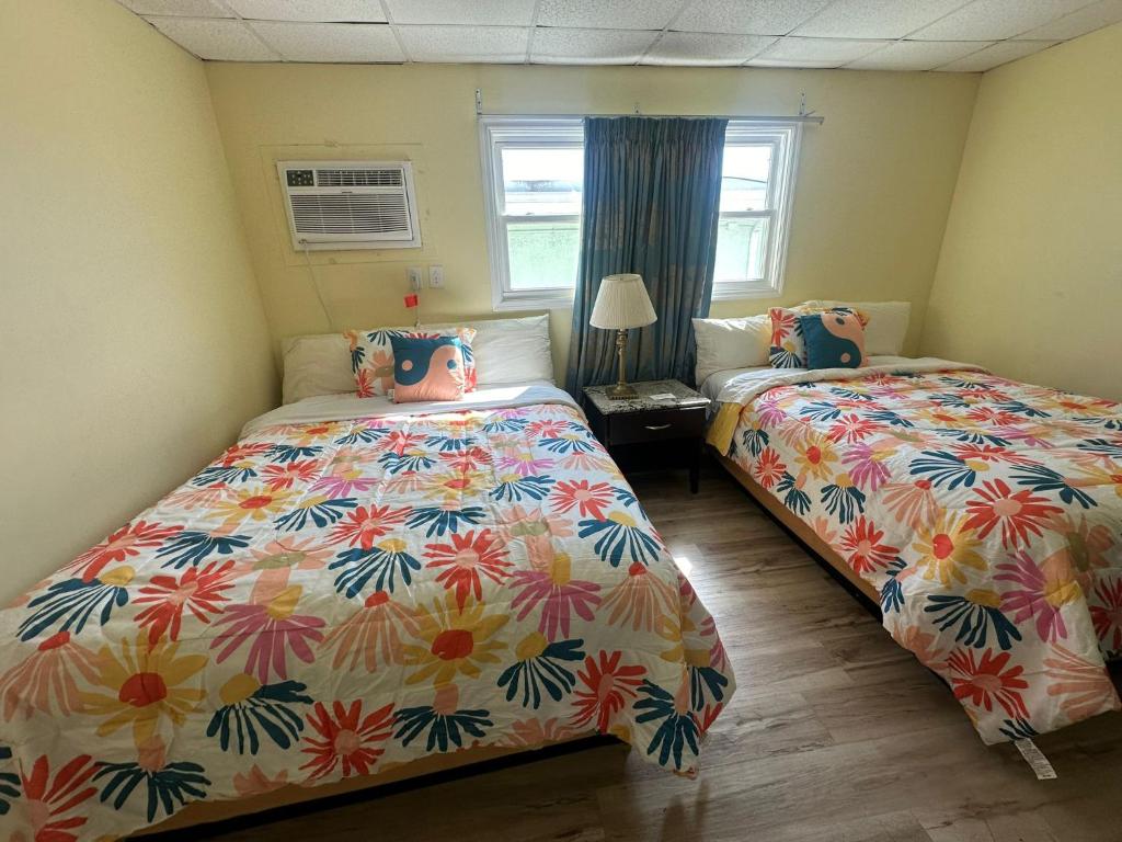 Postel nebo postele na pokoji v ubytování Searay - Motel