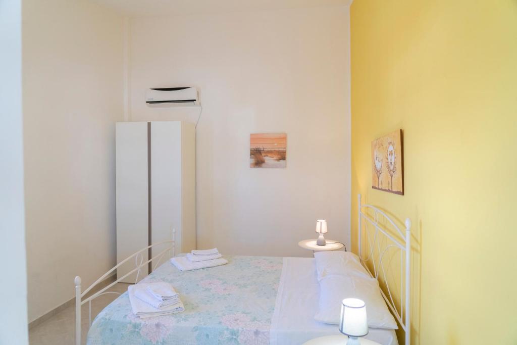 Postel nebo postele na pokoji v ubytování Villa Claudia e Simone